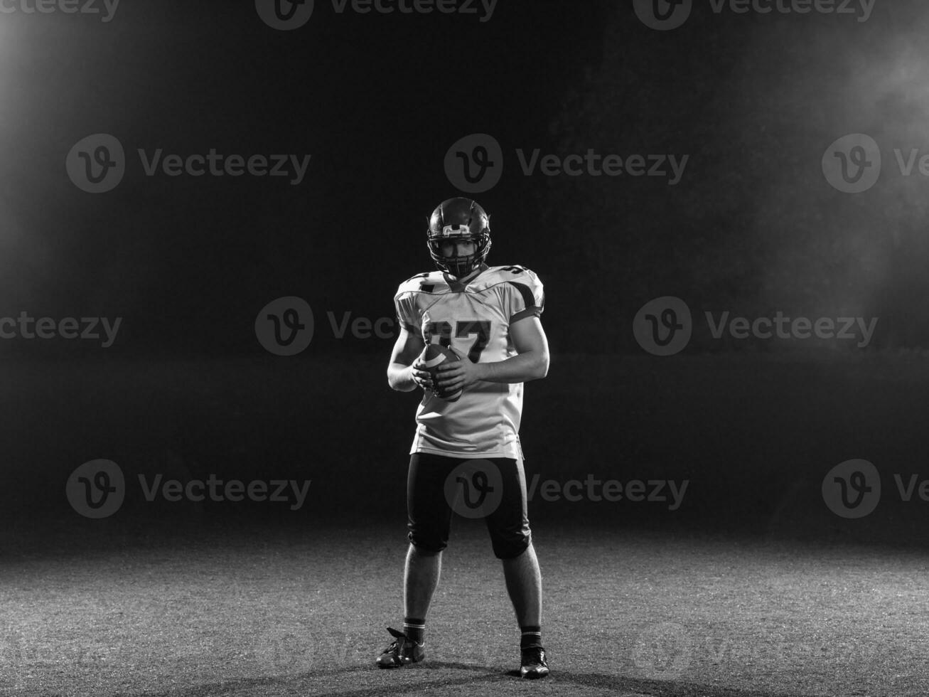 portrait of confident American football player photo