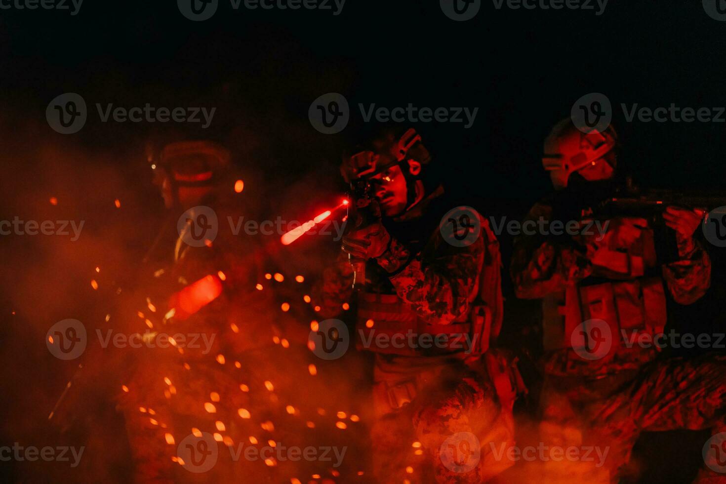 Soldiers squad in action on night mission using laser sight beam lights military team concept photo