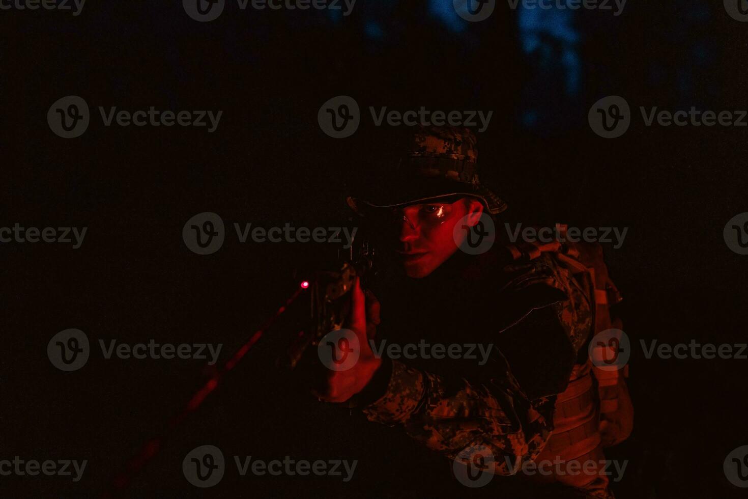 Soldiers squad in action on night mission using laser sight beam lights military team concept photo