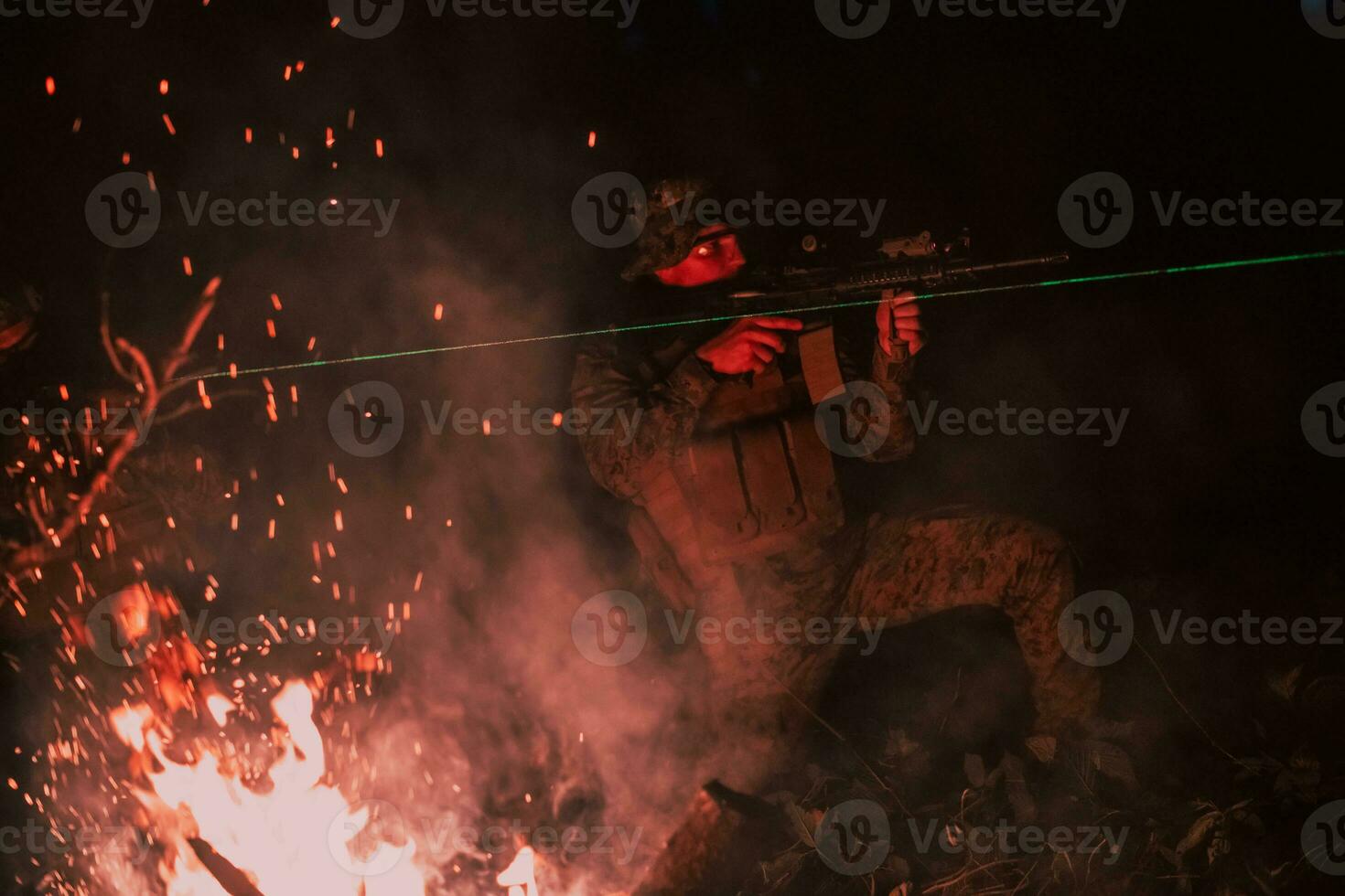 Soldiers squad in action on night mission using laser sight beam lights military team concept photo