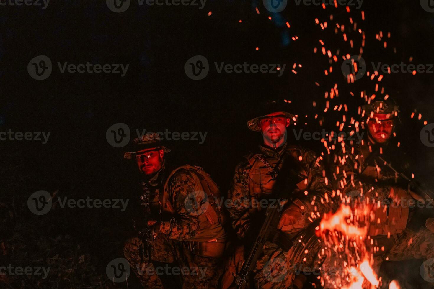 Soldiers squad in action on night mission using laser sight beam lights military team concept photo
