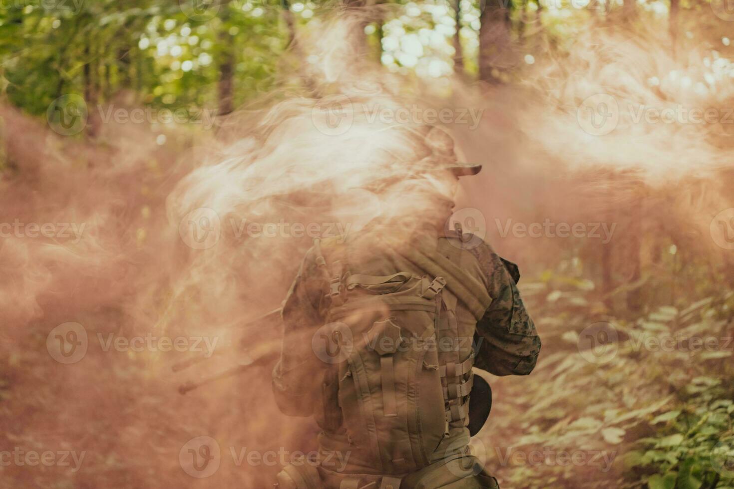 Battle of the military in the war. Military troops in the smoke photo