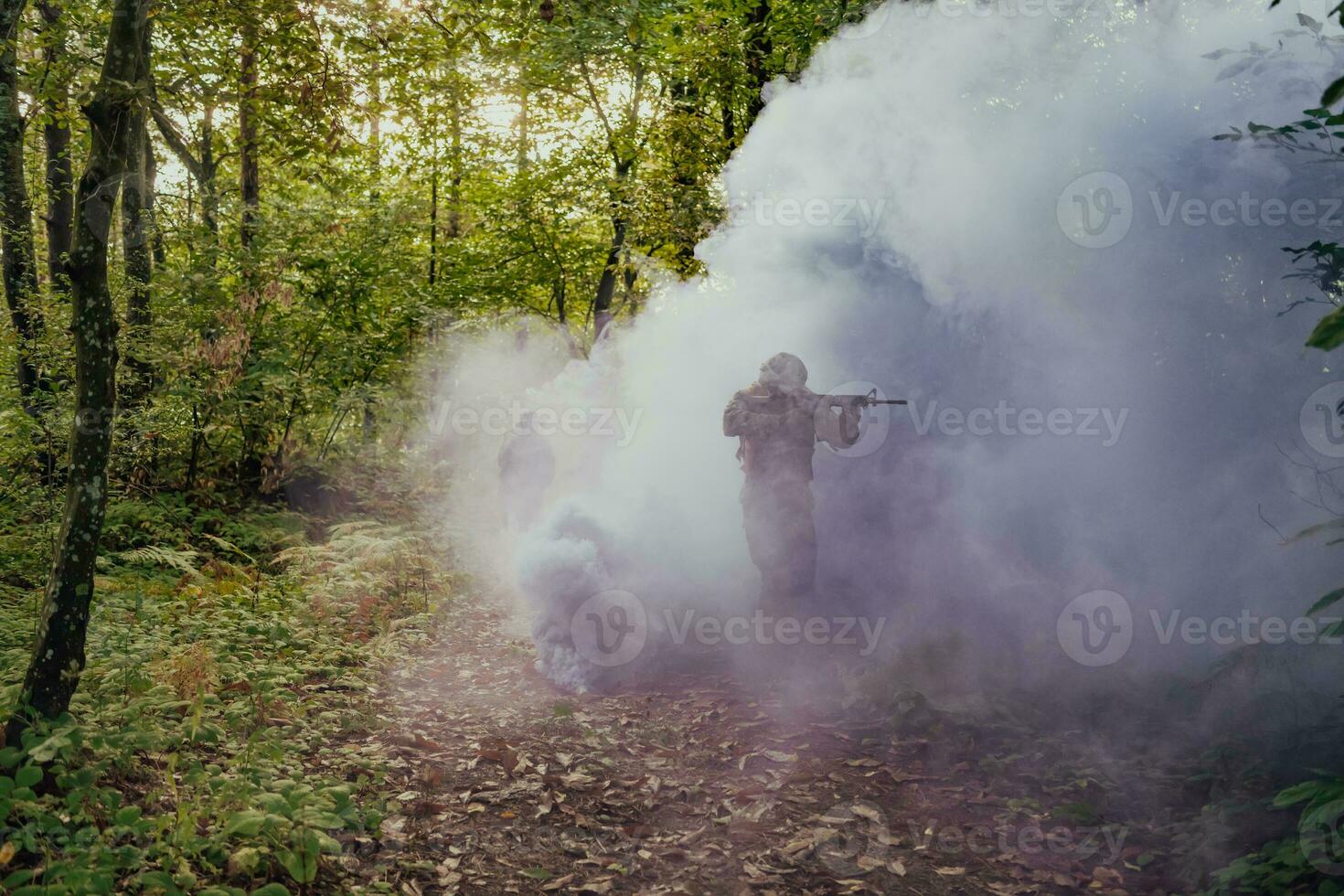 Battle of the military in the war. Military troops in the smoke photo