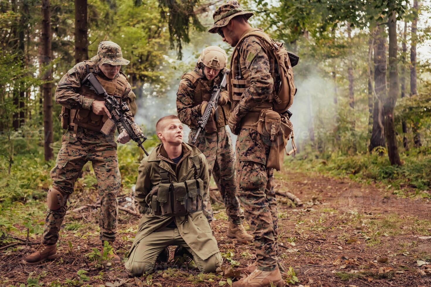 Soldiers squad was capture alive terrorist and interrogation them on them on special tactics violent way photo