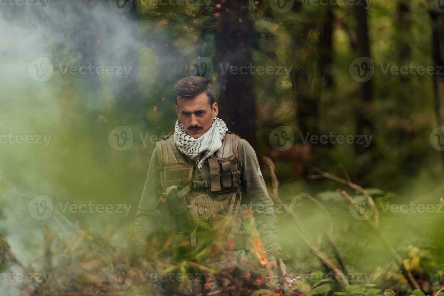 A modern warfare soldier on war duty in dense and dangerous forest areas. Dangerous military rescue operations photo