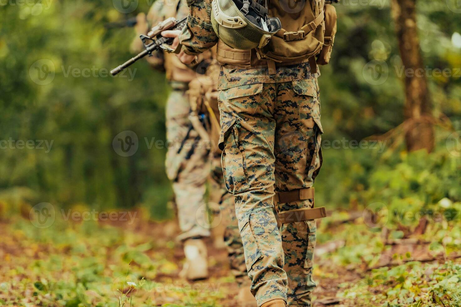 Modern warfare Soldiers Squad Running as Team in Battle Formation photo