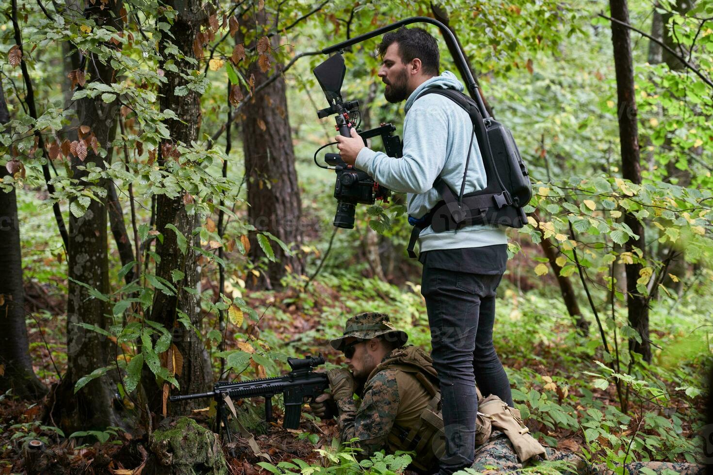 Videographer Taking Action Shoot of Soldiers in Action photo