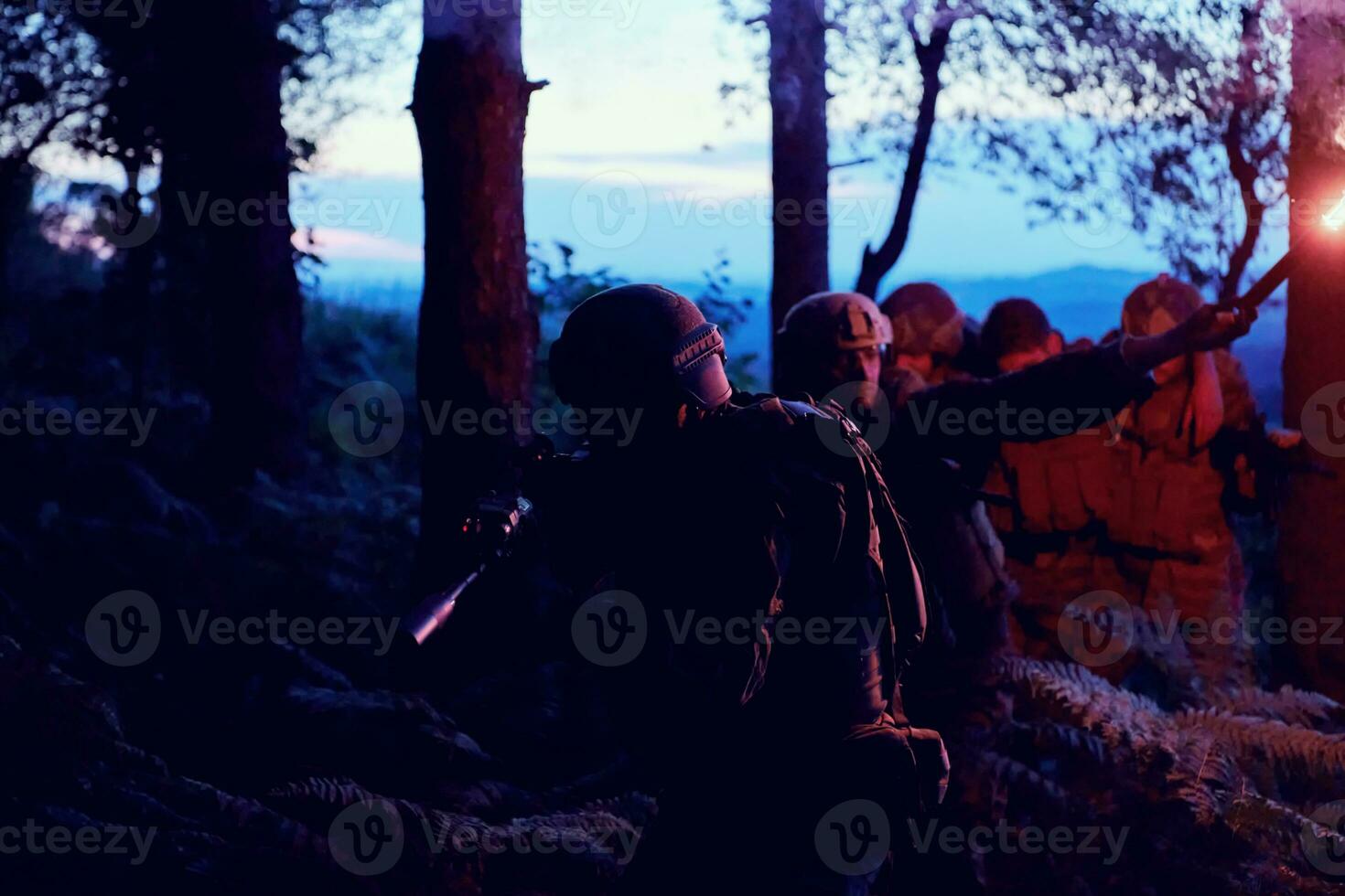 military squad in action rescue wounded soldier photo
