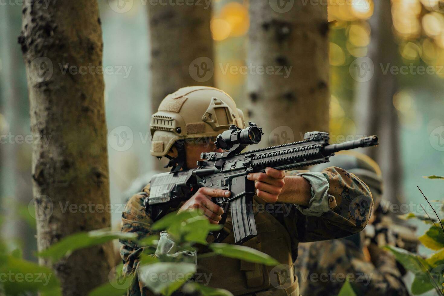 A modern warfare soldier on war duty in dense and dangerous forest areas. Dangerous military rescue operations photo