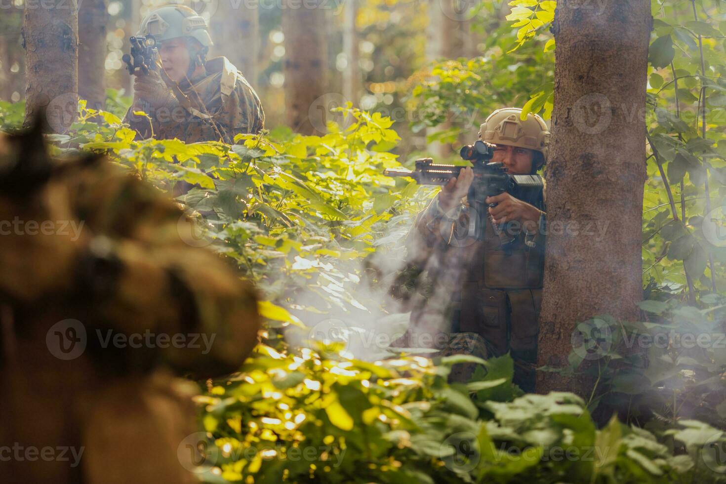 A modern warfare soldier on war duty in dense and dangerous forest areas. Dangerous military rescue operations photo