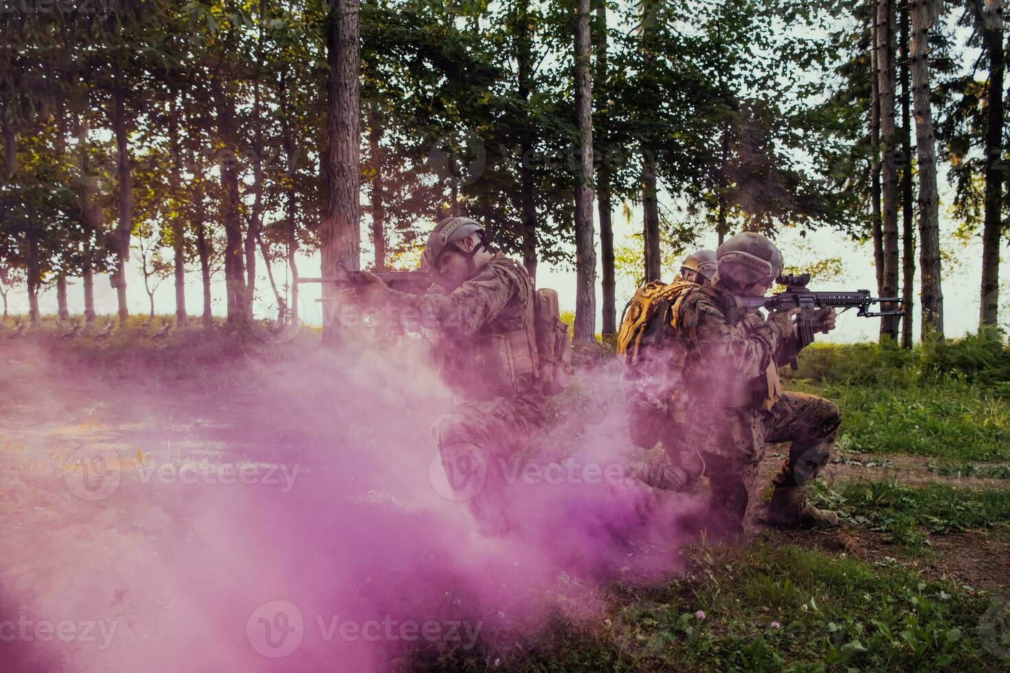 Soldier fighters standing together with guns. Group portrait of US army elite members, private military company servicemen, anti terrorist squad photo