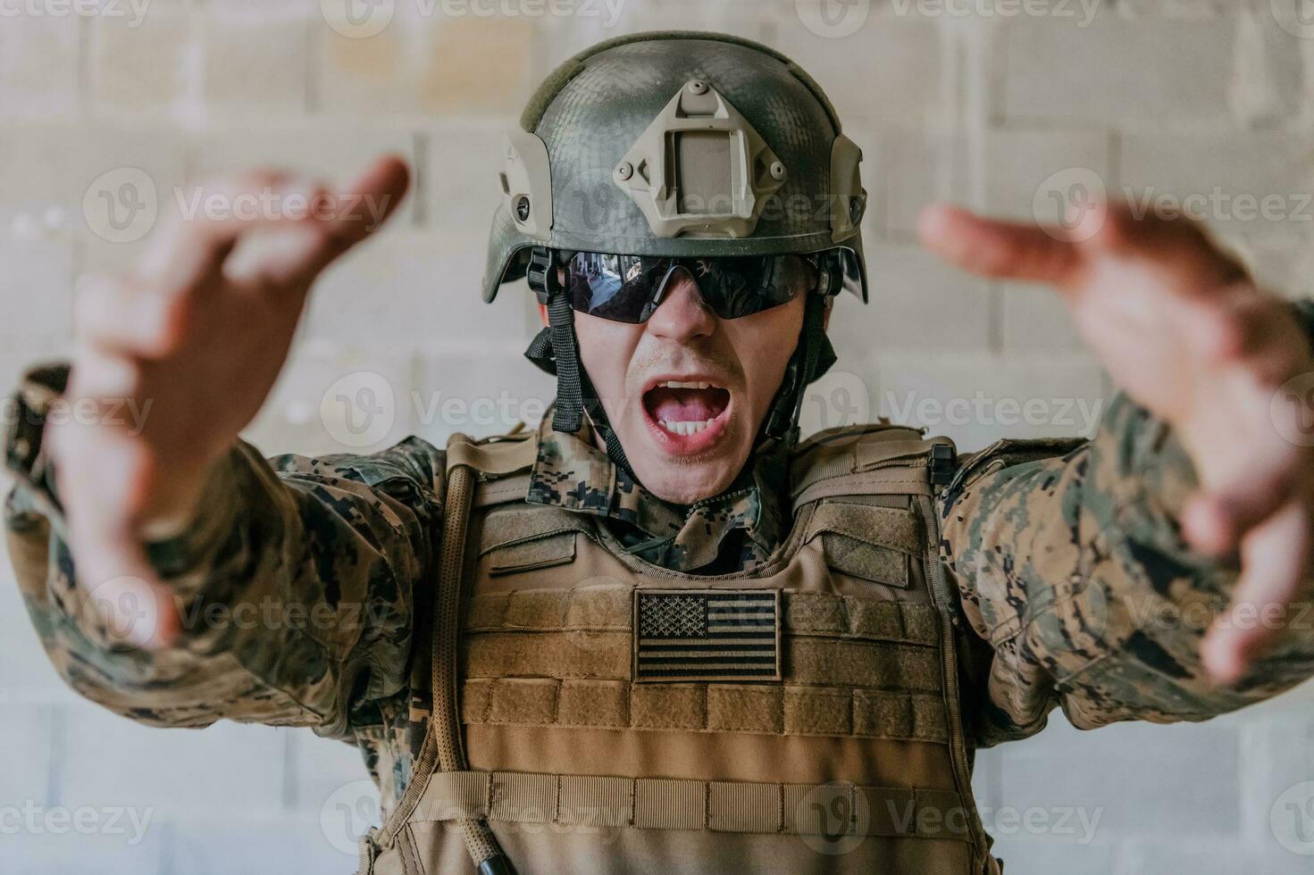 I choose you. A soldier with an outstretched hand towards the camera shows that he chooses you for support and partnership in warfare photo