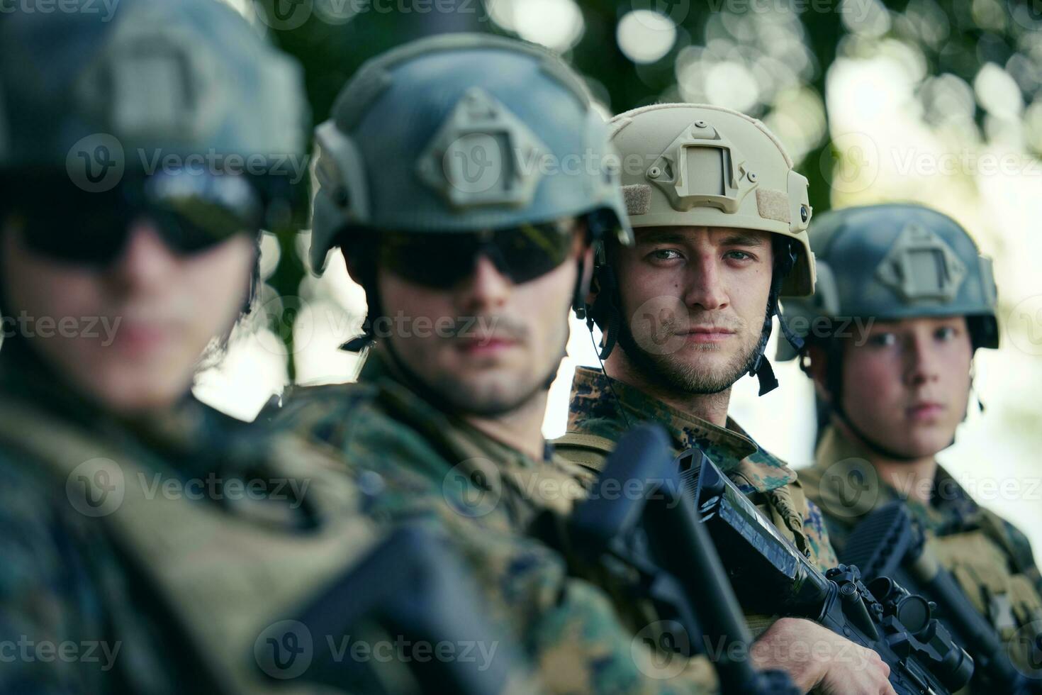Soldier fighters standing together photo