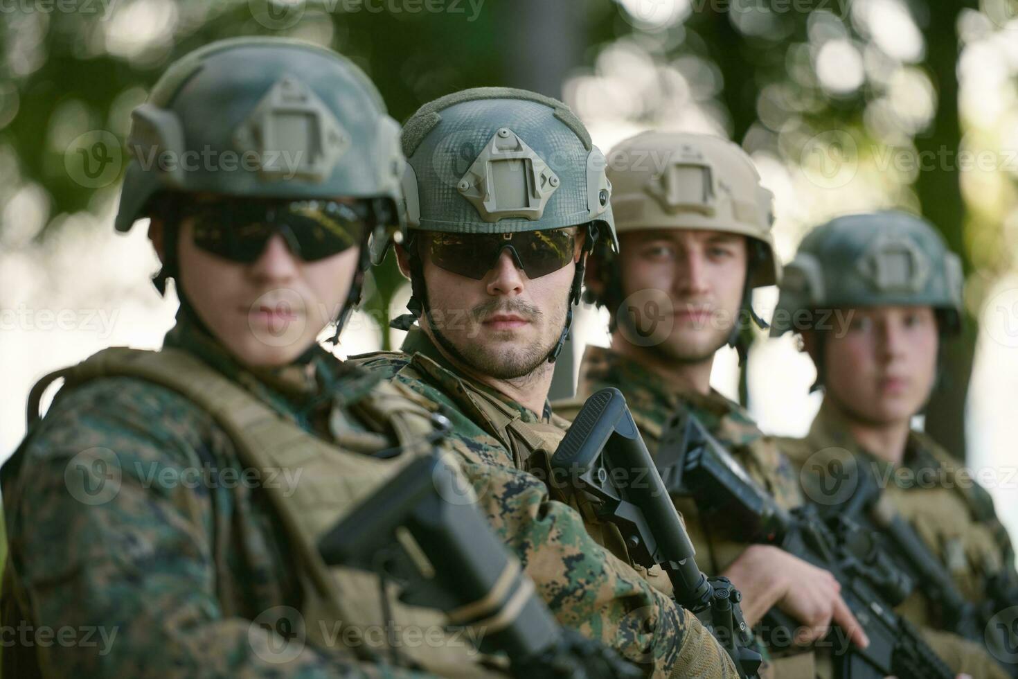 Soldier fighters standing together photo