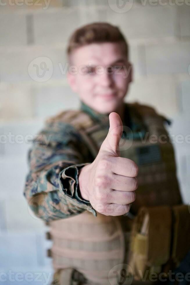 soldier showing thumb up photo