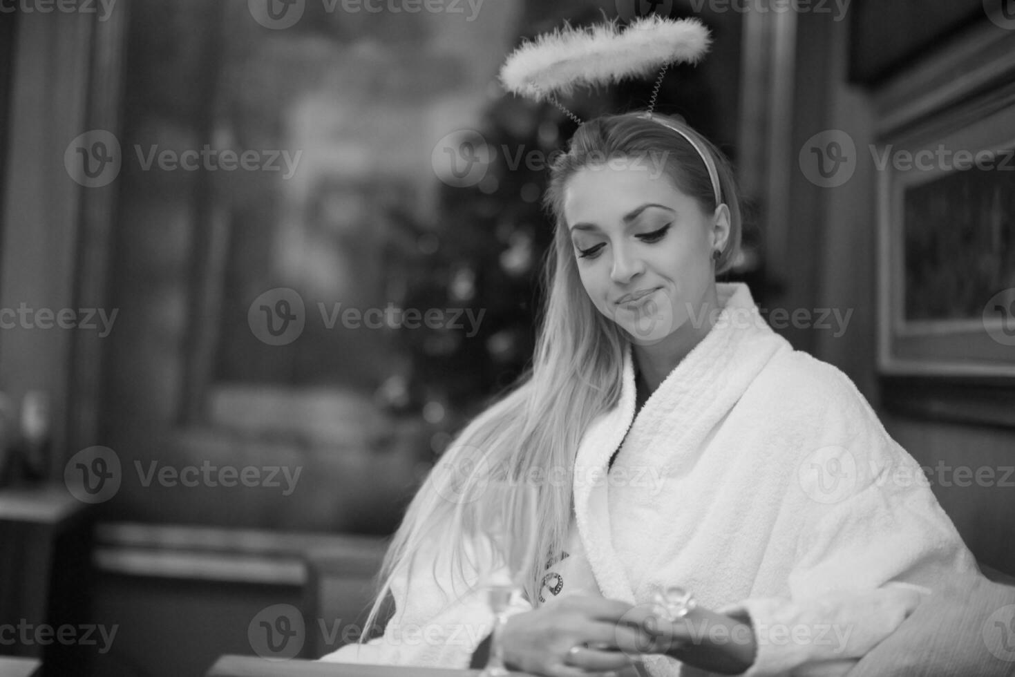 woman drinking champagne at spa photo