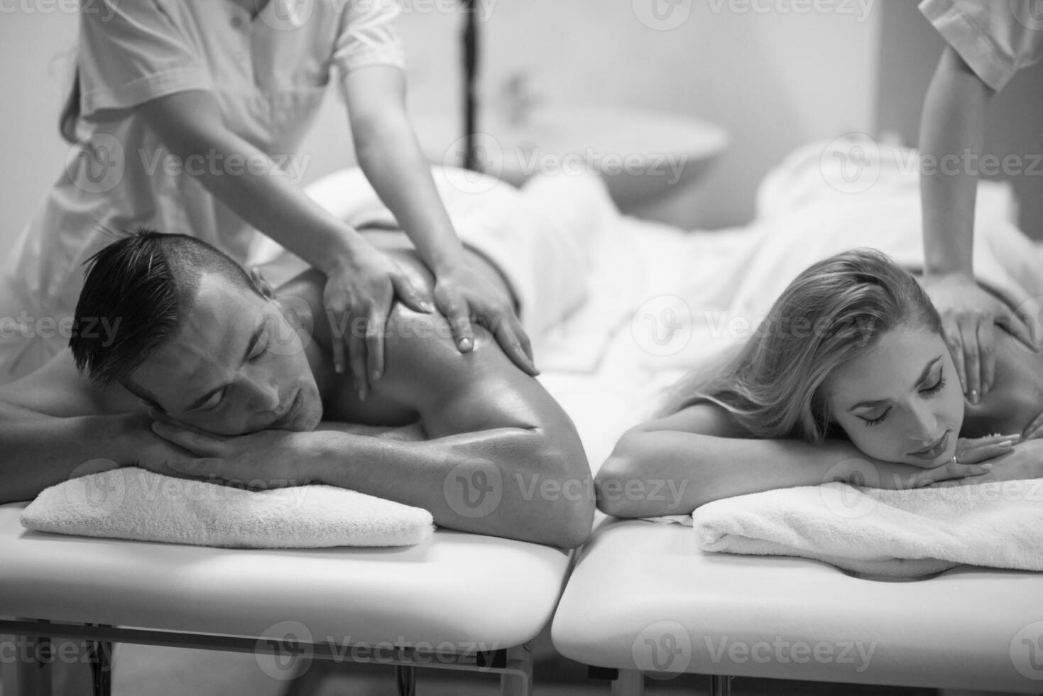 couple receiving a back massage photo