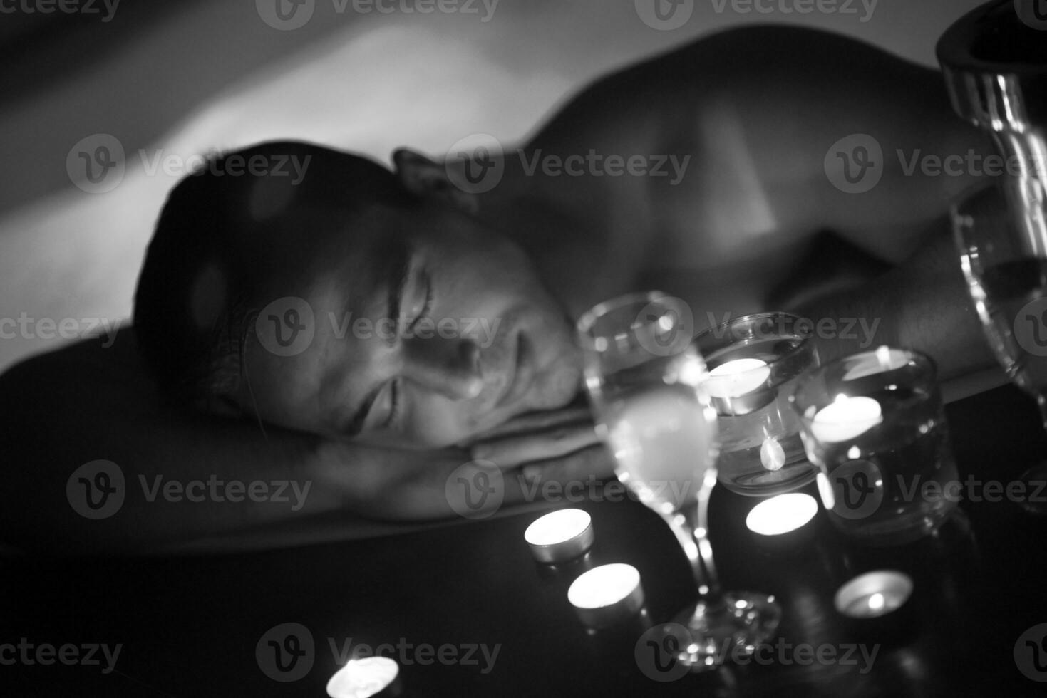 man relaxing in the jacuzzi photo