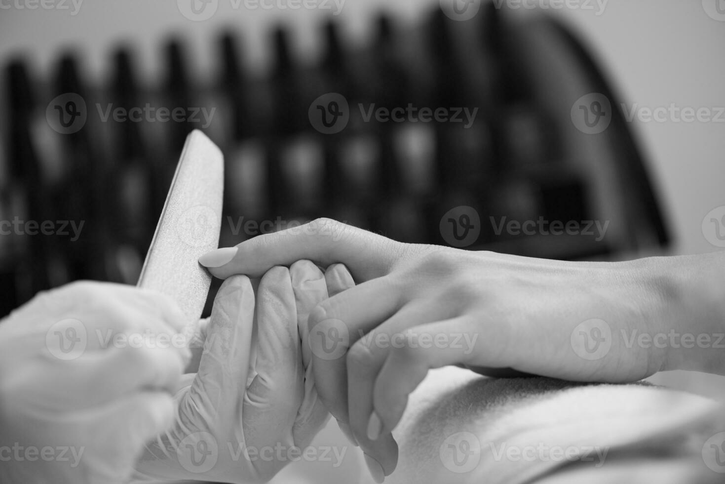 Woman hands receiving a manicure photo