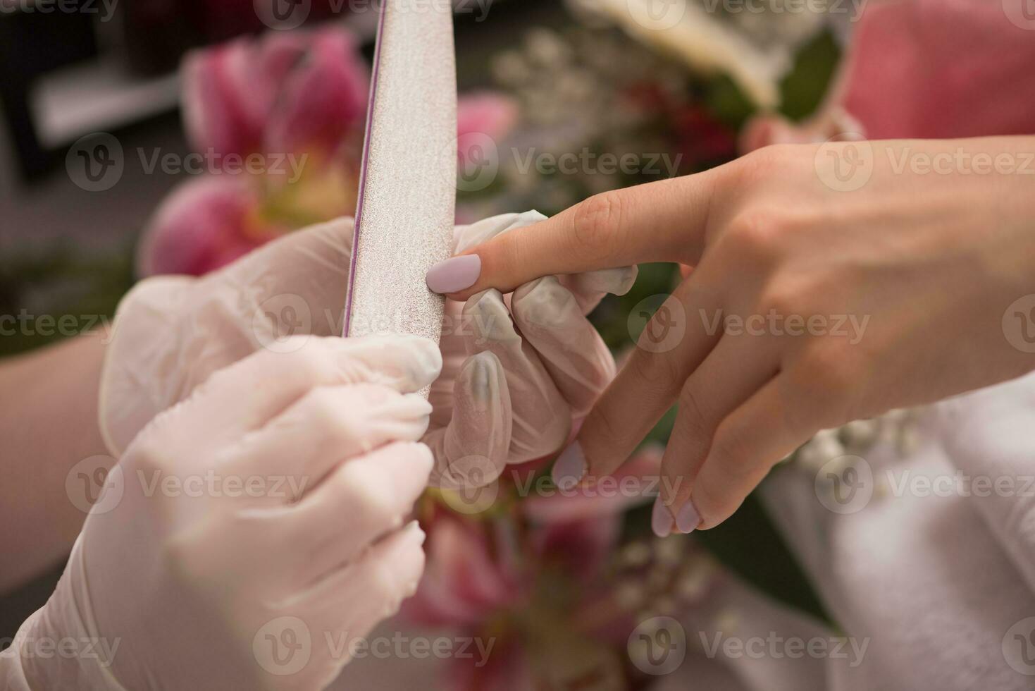 Woman hands receiving a manicure photo