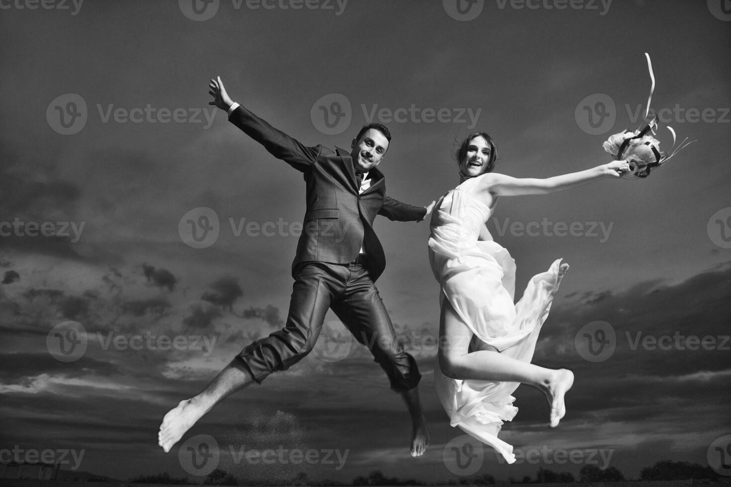 romantic beach wedding at sunset photo