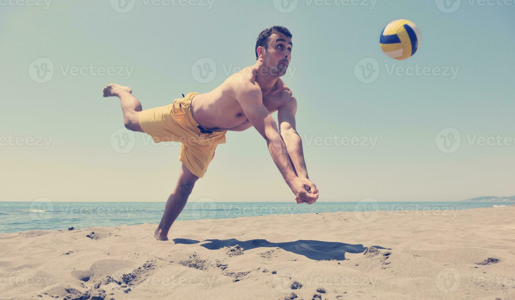 male beach volleyball game player photo