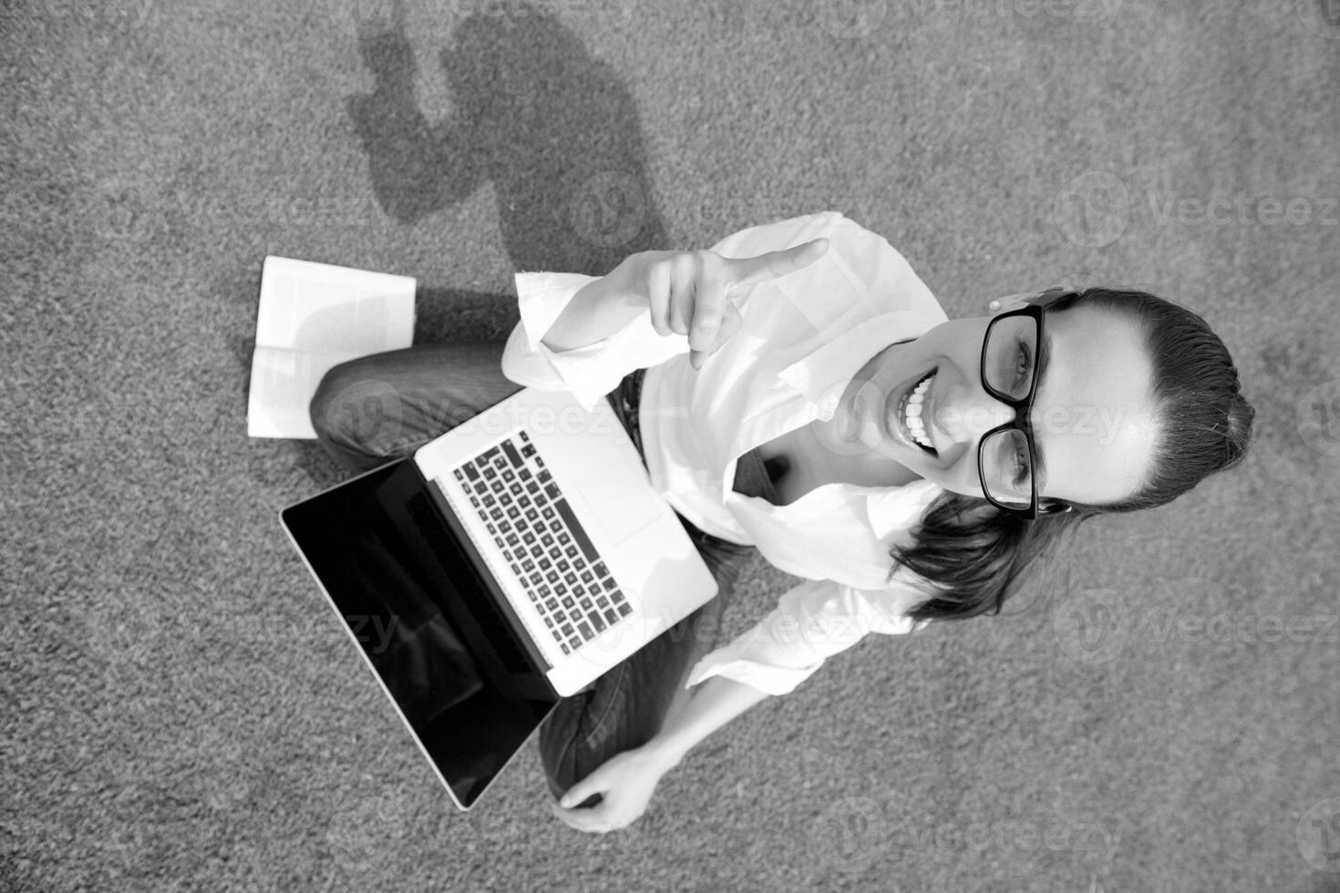 woman with laptop in park photo