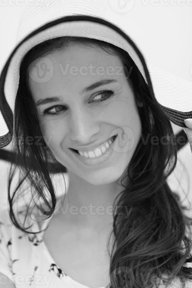 portrait of happy young woman on beach photo