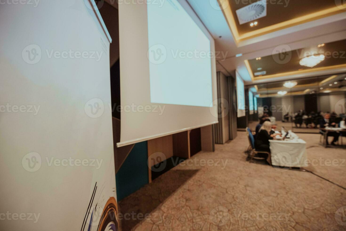 Blurred photo of the conference room where the business seminar is held