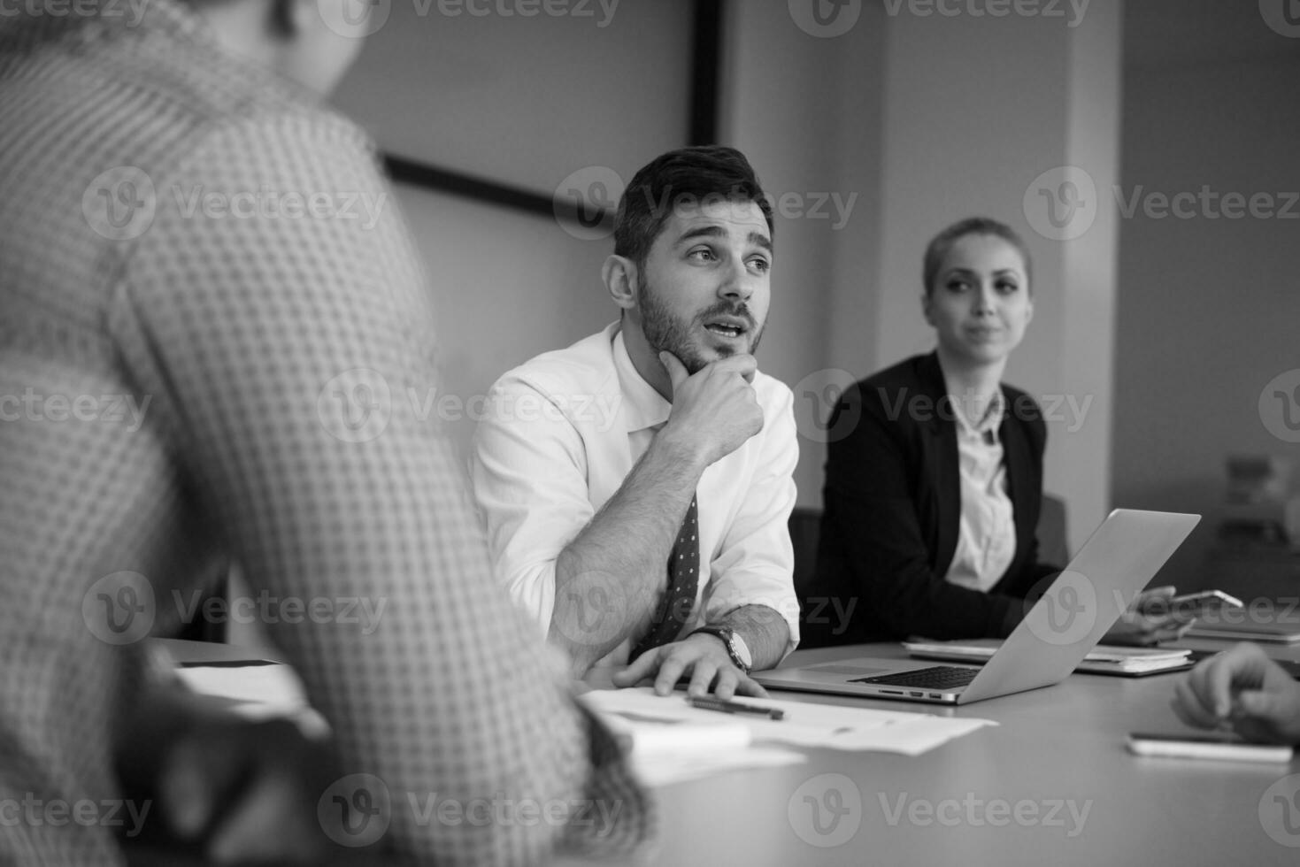 business people group on meeting at modern startup office photo