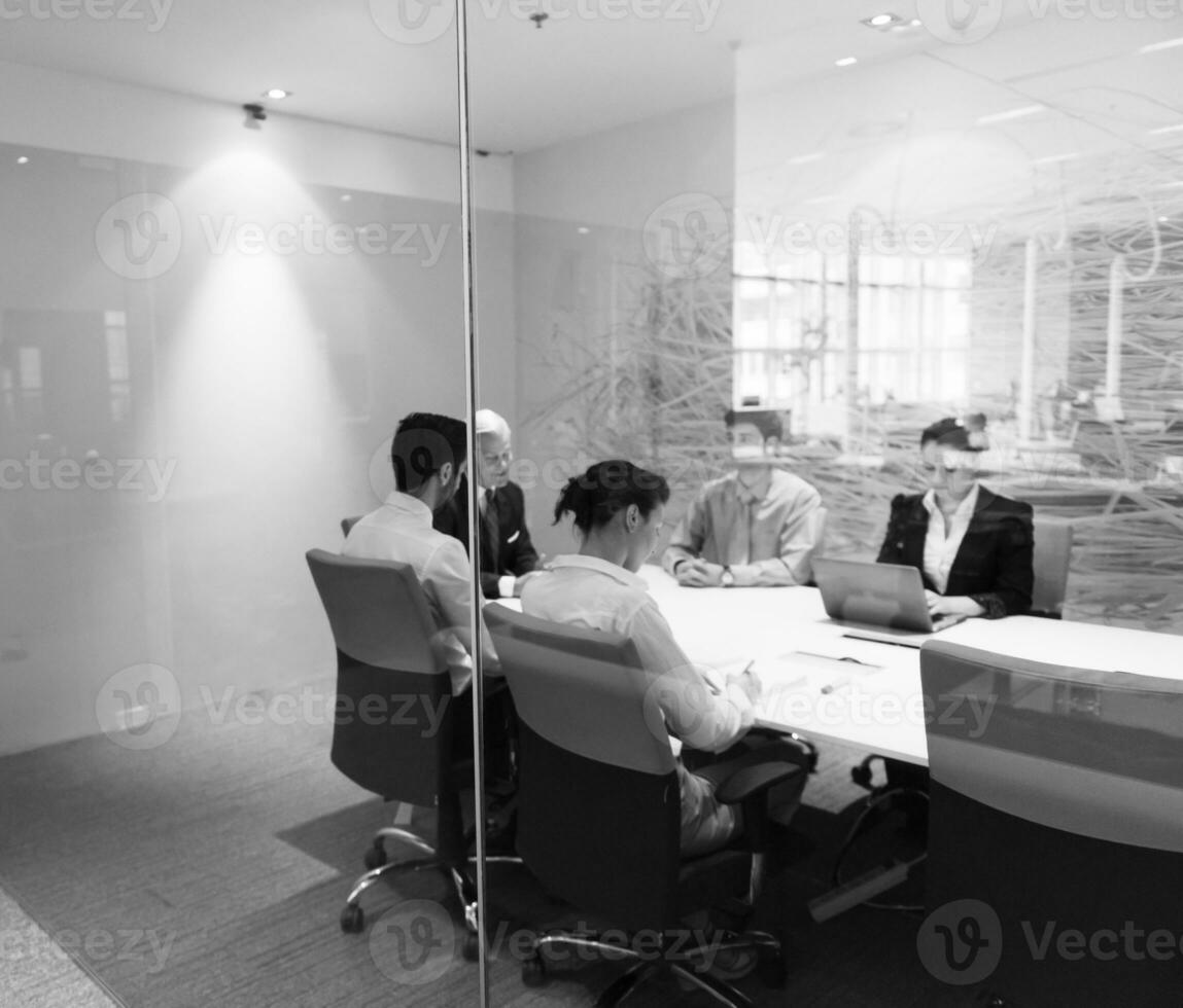 business people group on meeting at modern startup office photo