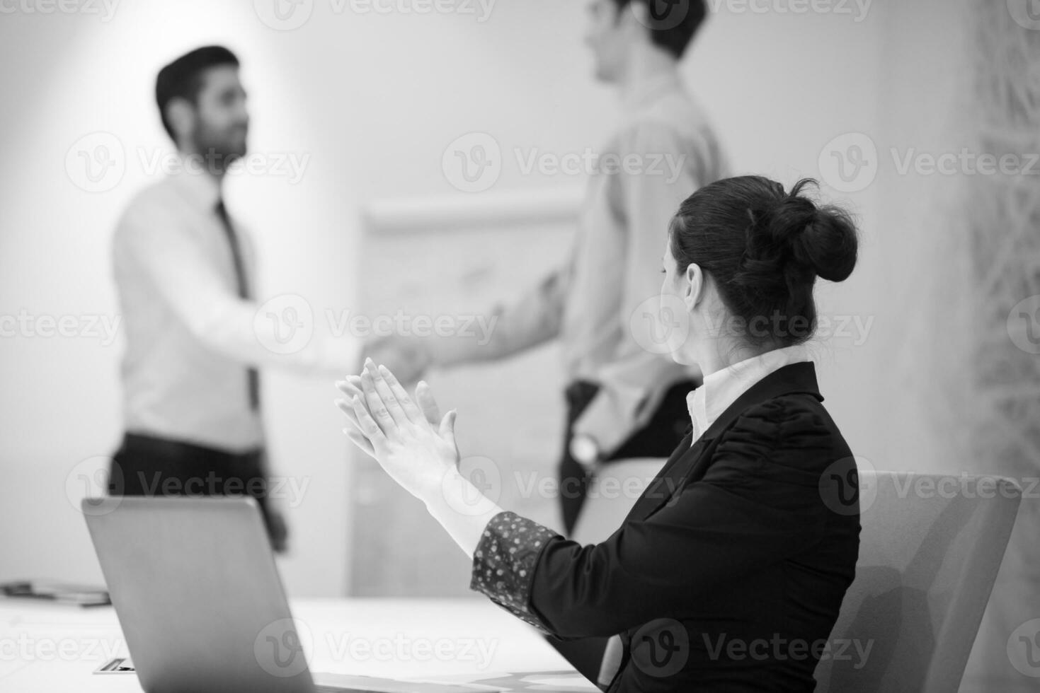 young business woman on meeting  using laptop computer photo