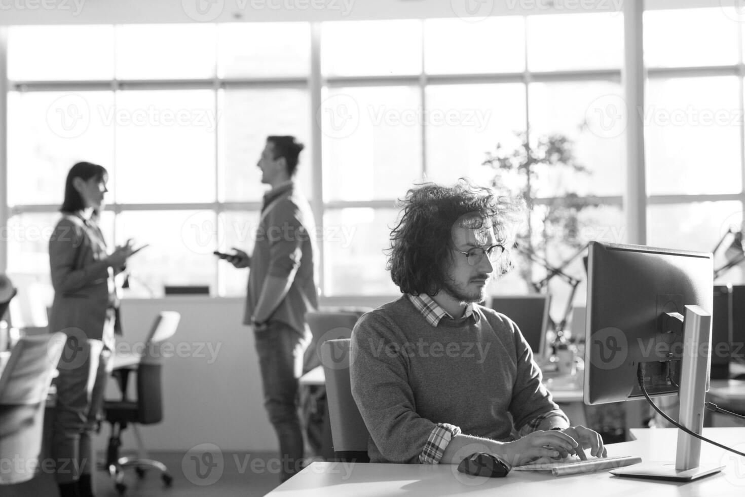 businessman working using a computer in startup office photo