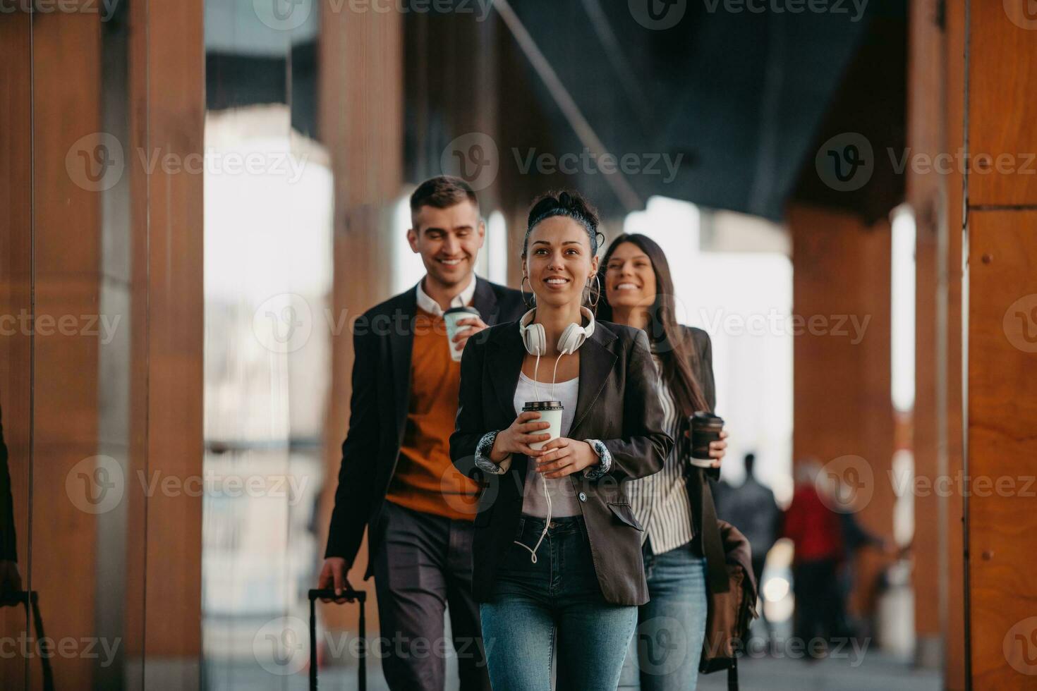 Elegant businesspeople walking in a modern city.. photo