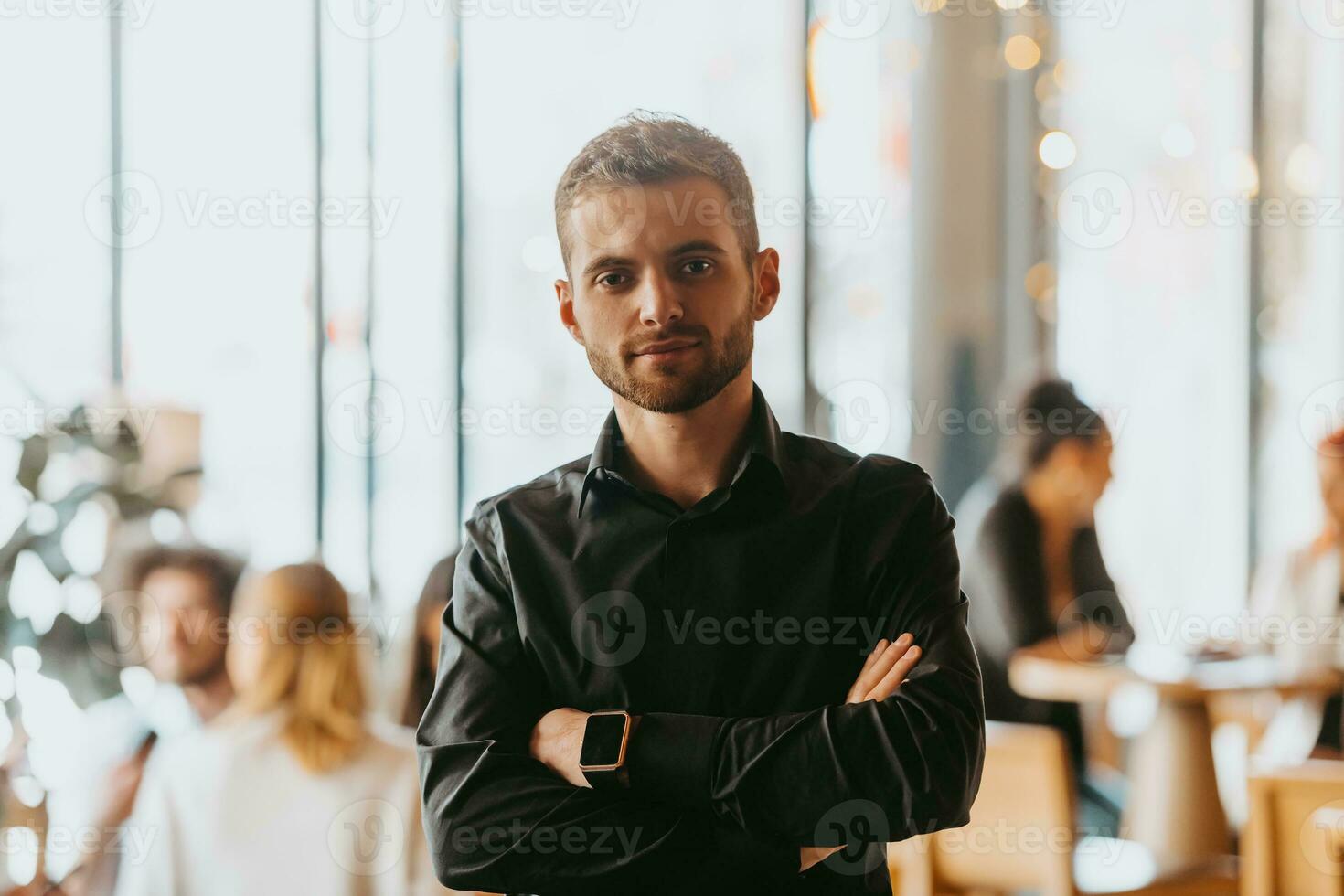 Cheerful self confident professional businessman with crossed hands portrait. photo