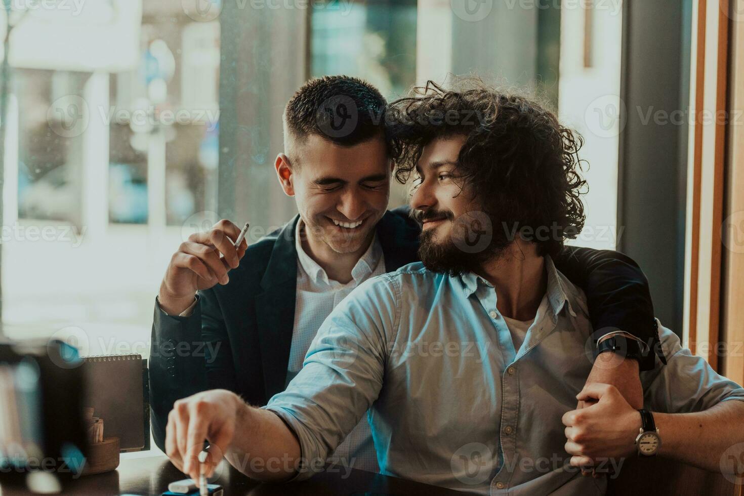 Portrait of multiethnic diverse gay LGBT romantic male couple embracing and showing their love photo