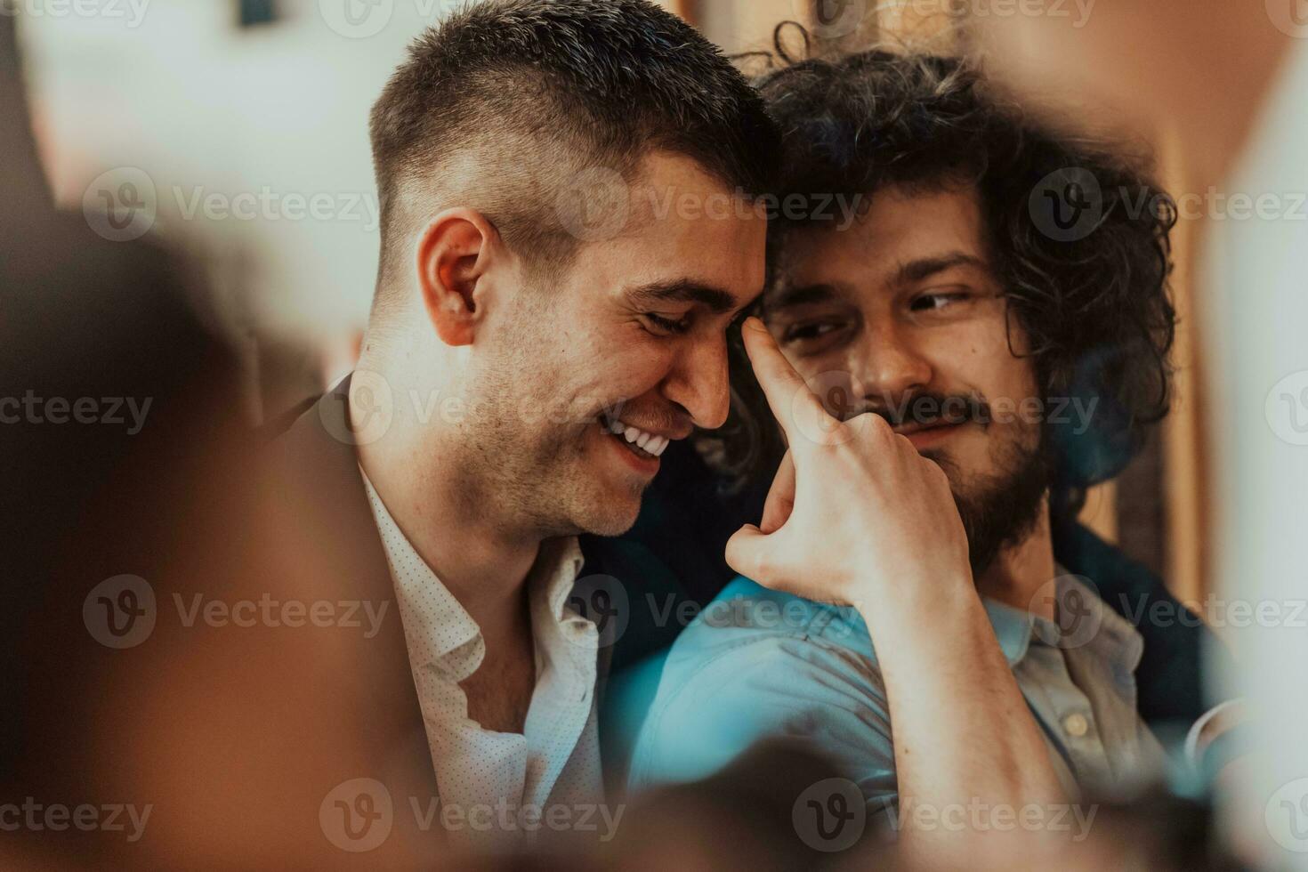 Portrait of multiethnic diverse gay LGBT romantic male couple embracing and showing their love photo