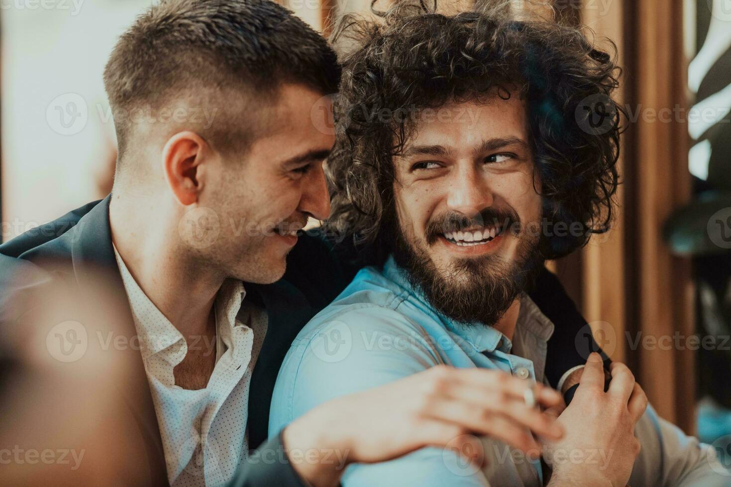 Portrait of multiethnic diverse gay LGBT romantic male couple embracing and showing their love photo