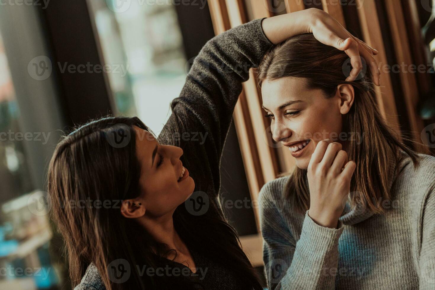 Diverse friends girls lesbian couple hugging. Stylish cool generation z women dating in love enjoy romantic relationships photo