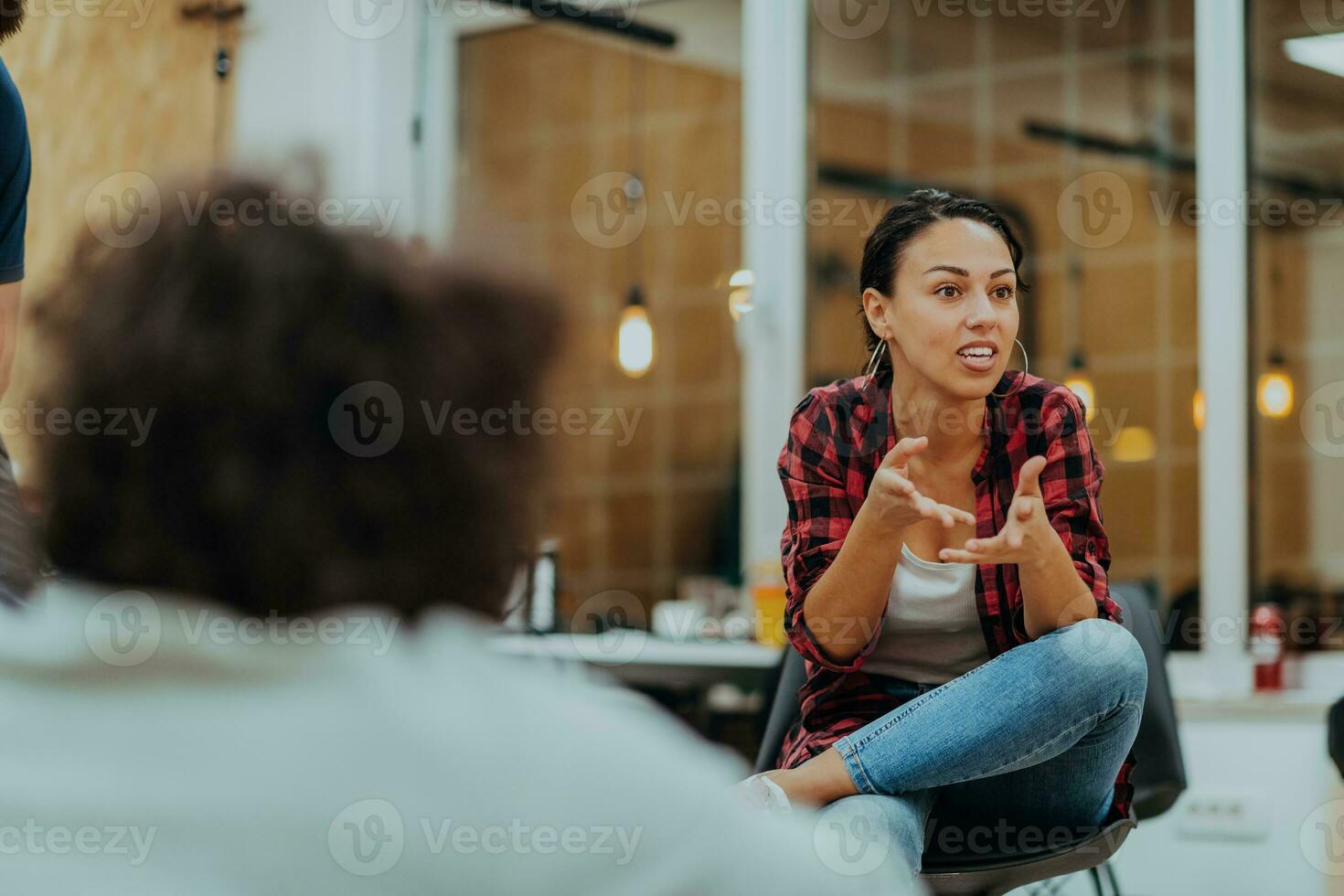 Multiethnic group of employees working in a marketing company. A group of colleagues is working on a project in modern offices photo