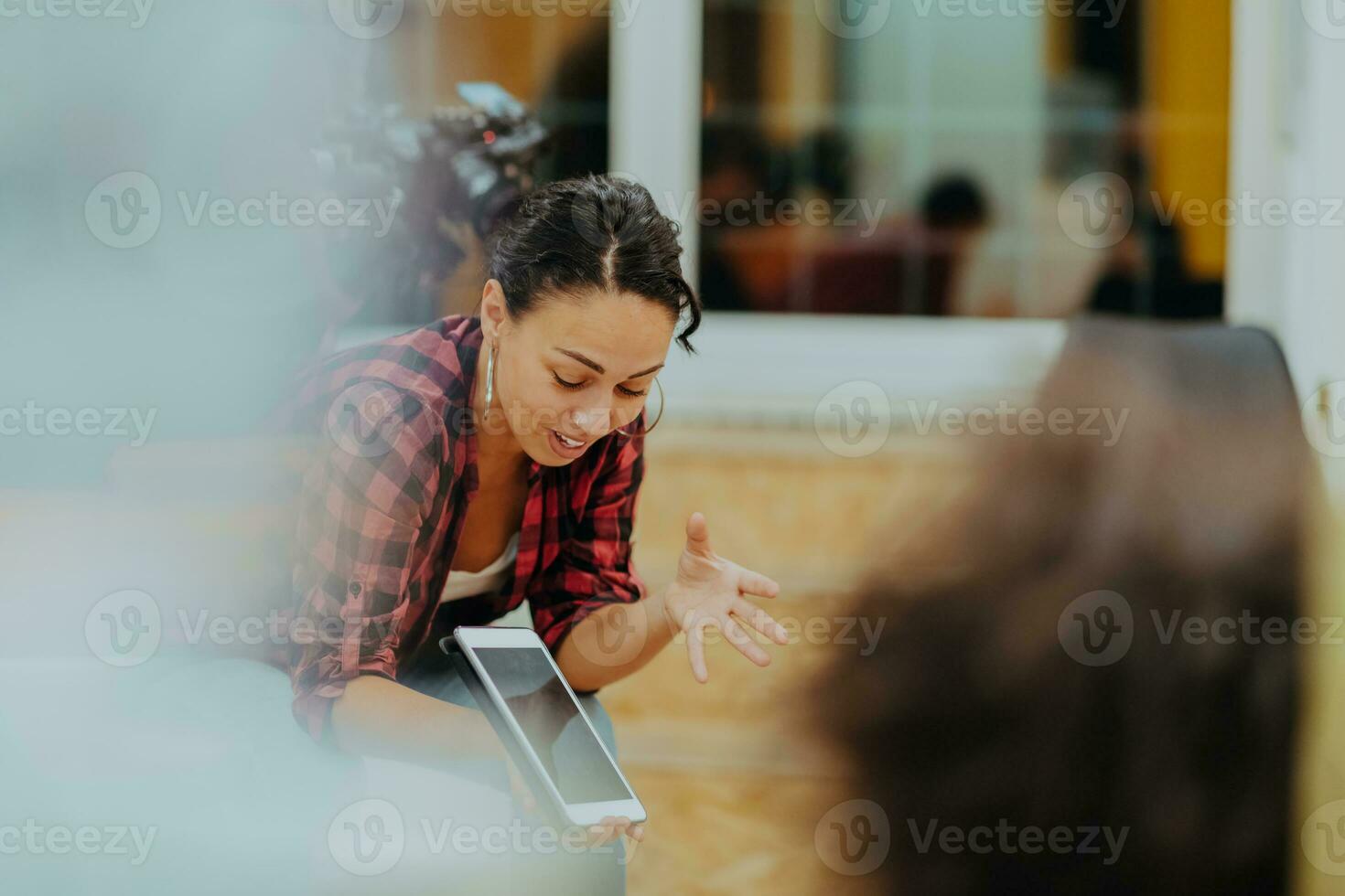 Multiethnic group of employees working in a marketing company. A group of colleagues is working on a project in modern offices photo