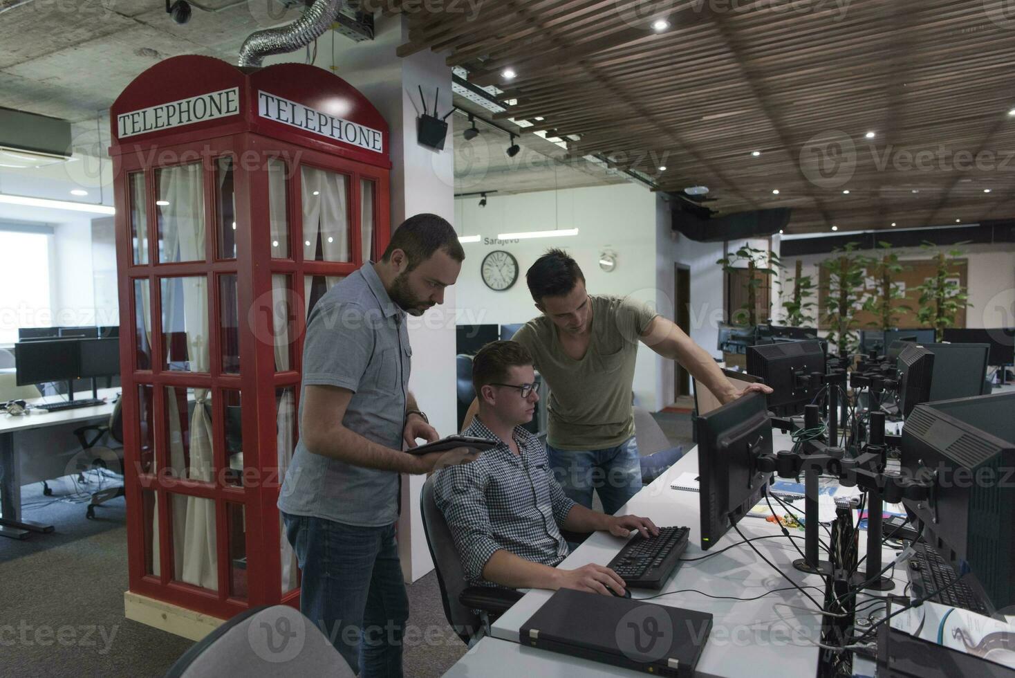startup business people group working as team to find solution photo