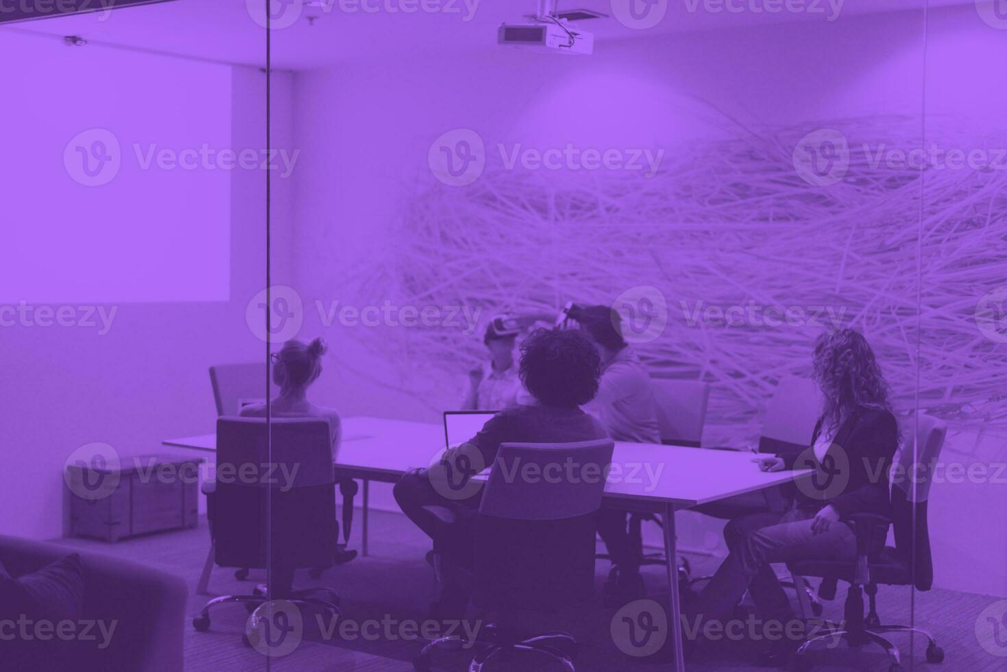 startup business team using virtual reality headset photo
