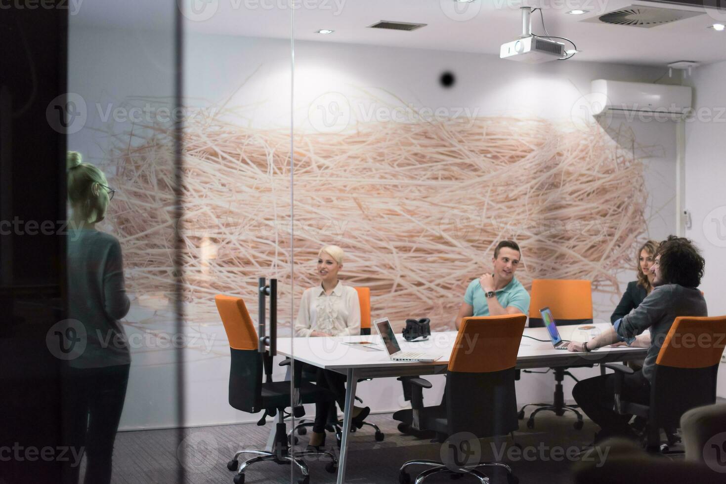 Startup Business Team At A Meeting at modern night office building photo