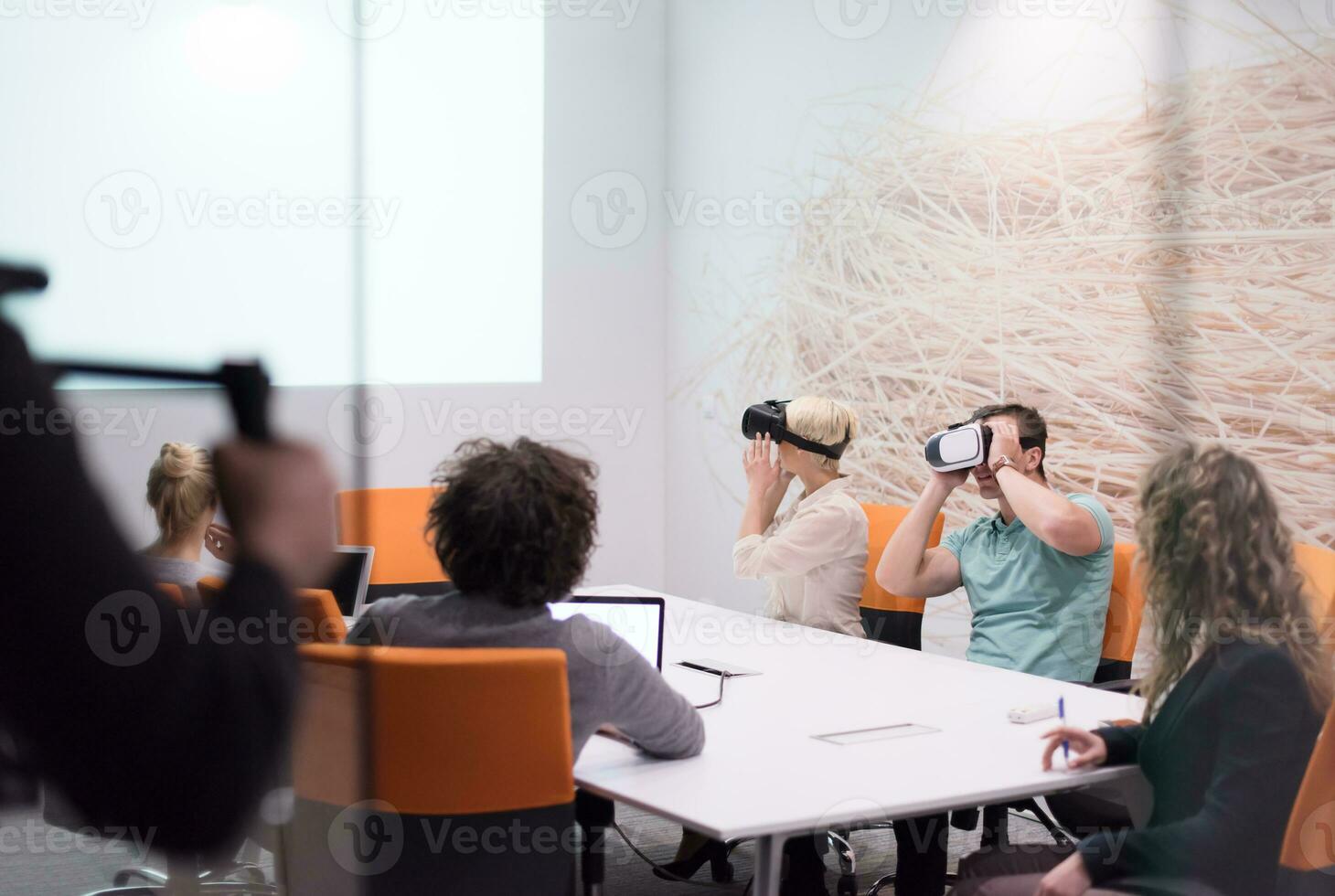 startup business team using virtual reality headset photo