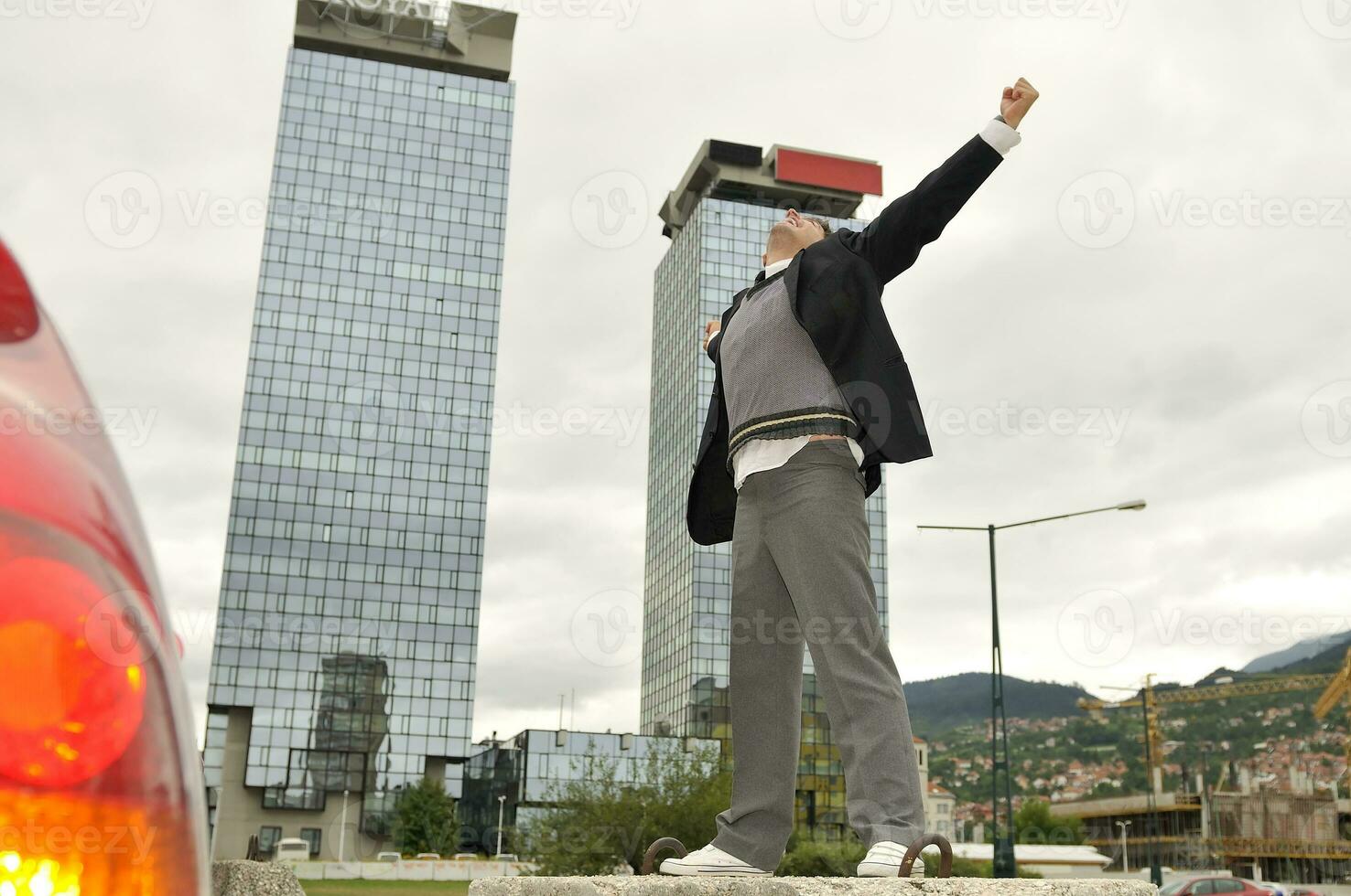 Photo of happy winner businessman  screaming from joy