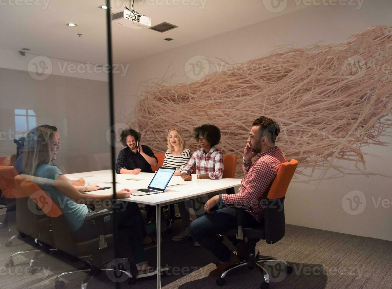 Multiethnic startup business team on meeting photo