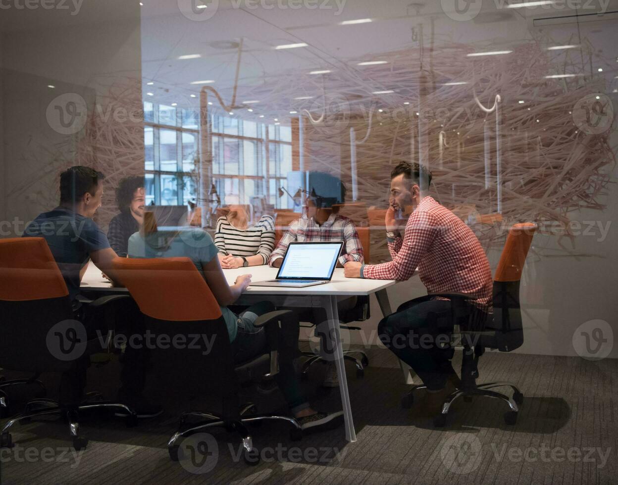 Multiethnic startup business team on meeting photo