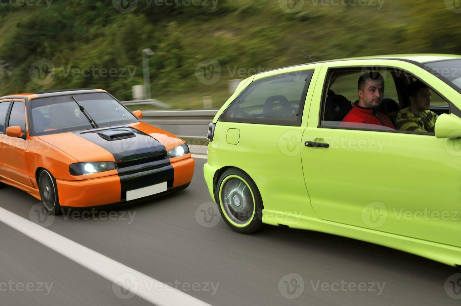 Tuning cars sacing down the highway photo