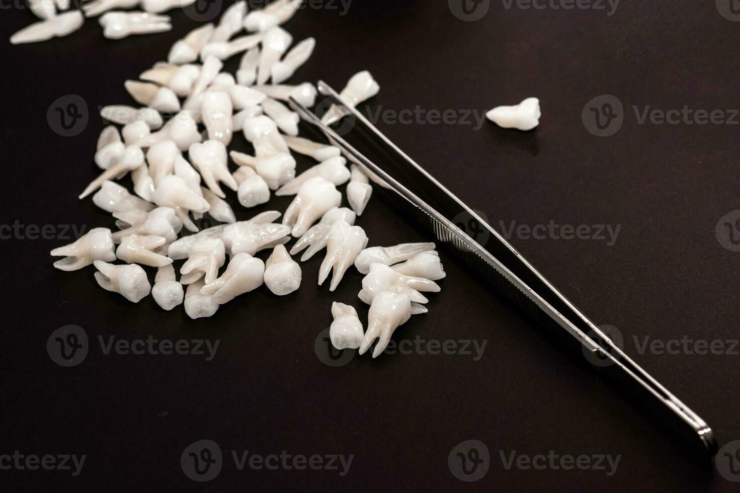 Teeth implant and crown installation process parts isolated on a black background. Medically accurate 3D model. photo